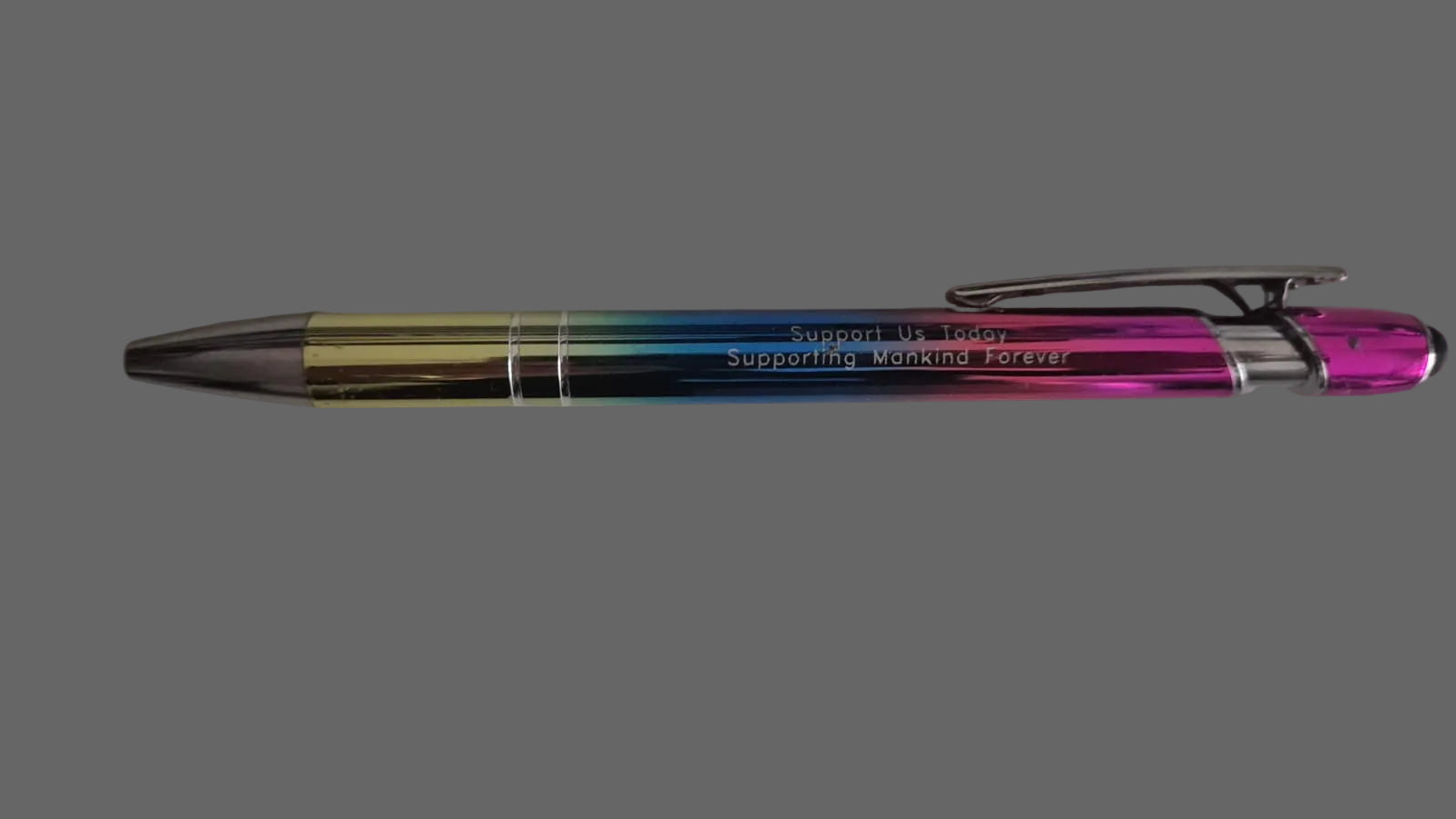 Multicolored pen on a plain background